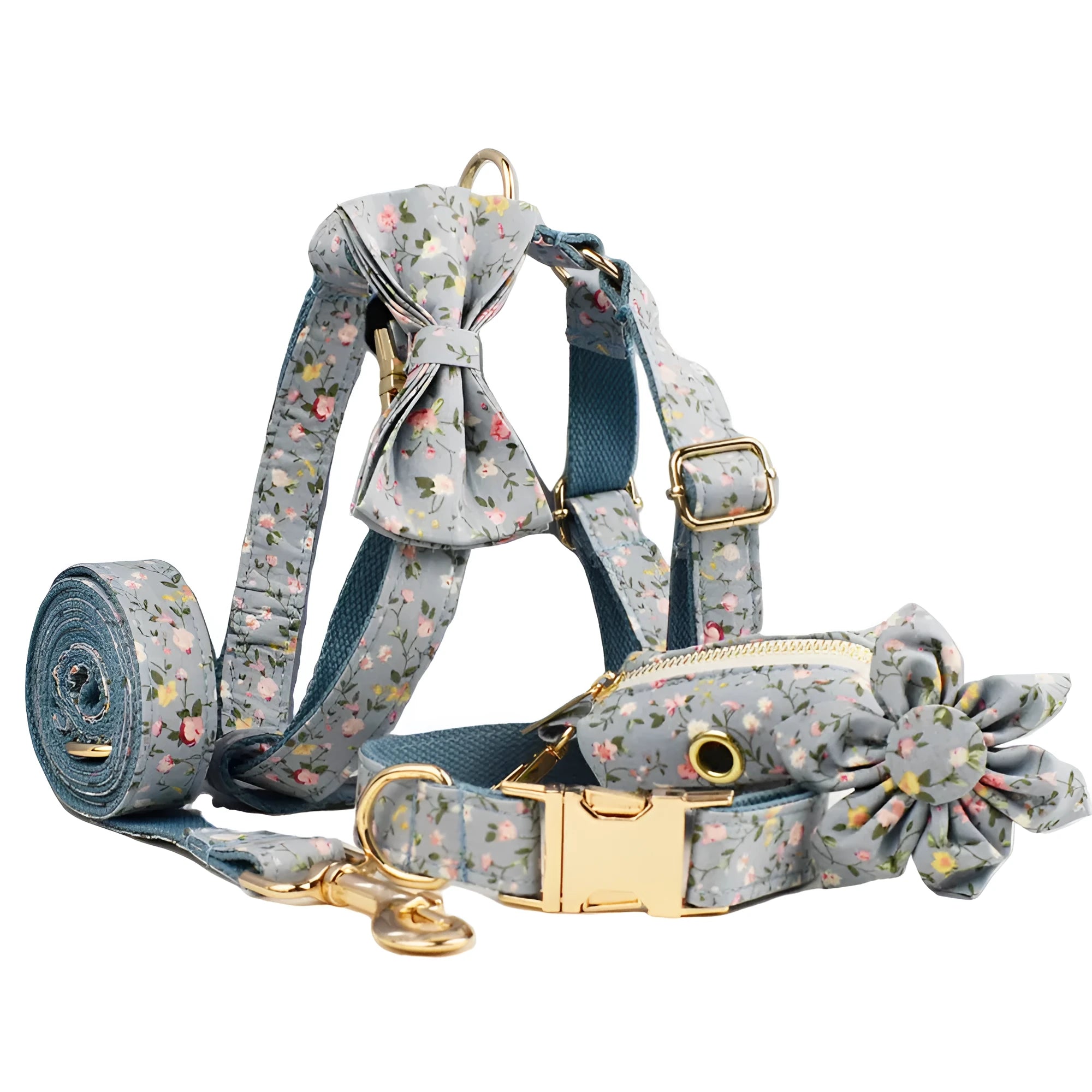 Blue floral pattern dog collar with matching leash, bow tie, vest and waste bag accessories on white background