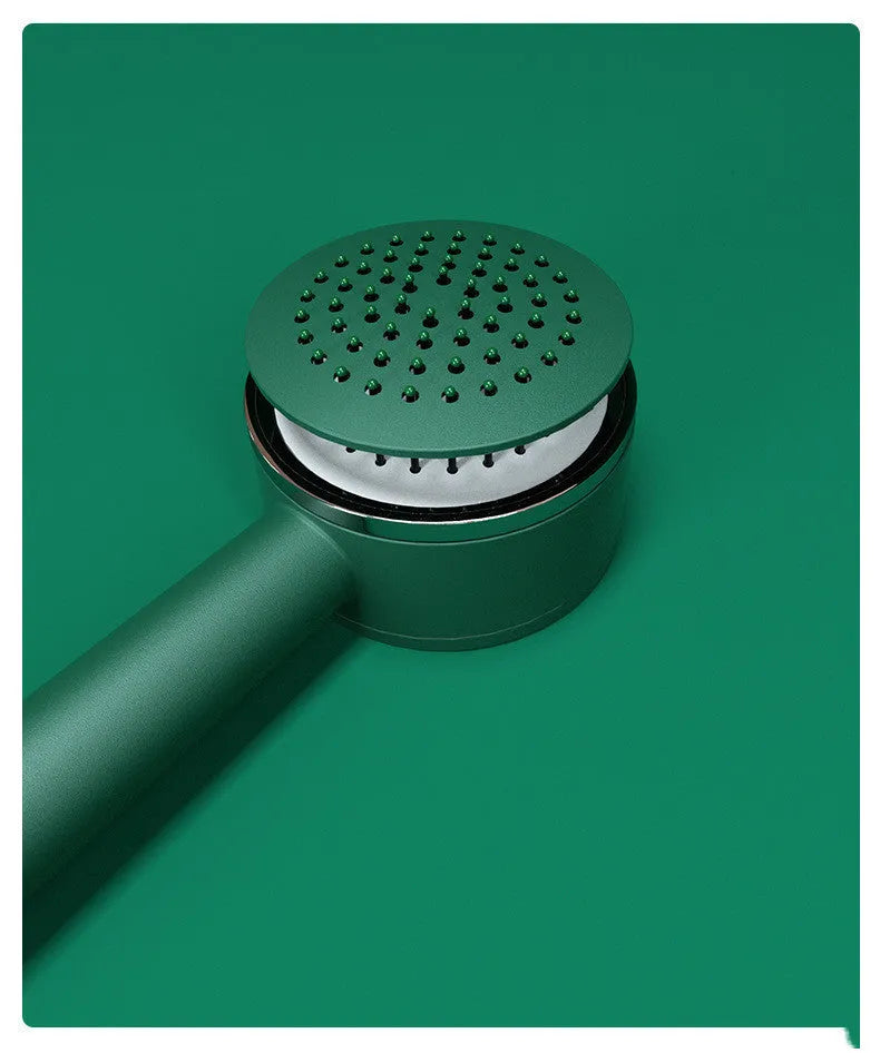 Plastic air cushion comb with long handle in white, green, and pink colours for hair detangling and styling