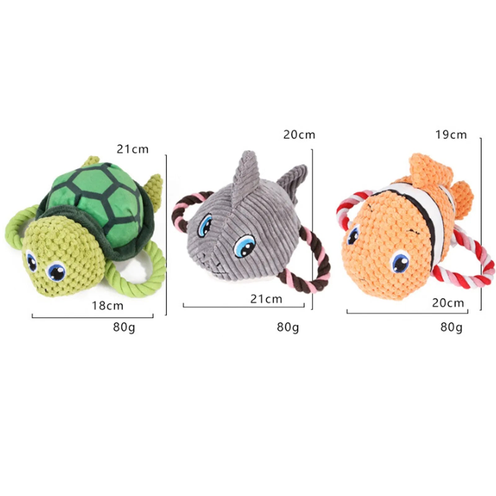 Grey turtle-shaped plush dog toy with four knotted rope legs on a wooden floor.