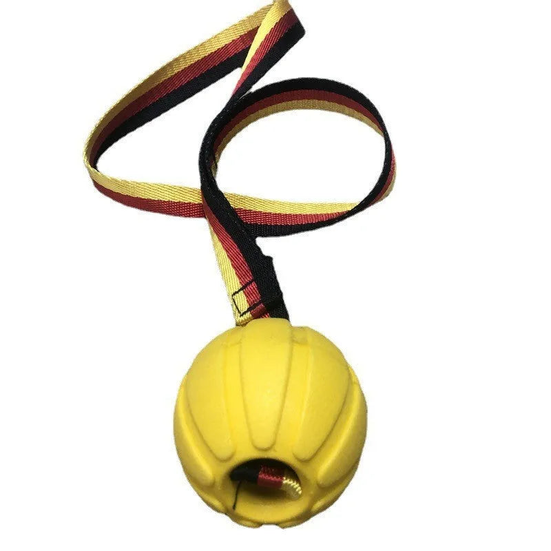 Yellow and camouflage coloured EVA foam floating tetherball dog toys in three different sizes on a blue background.