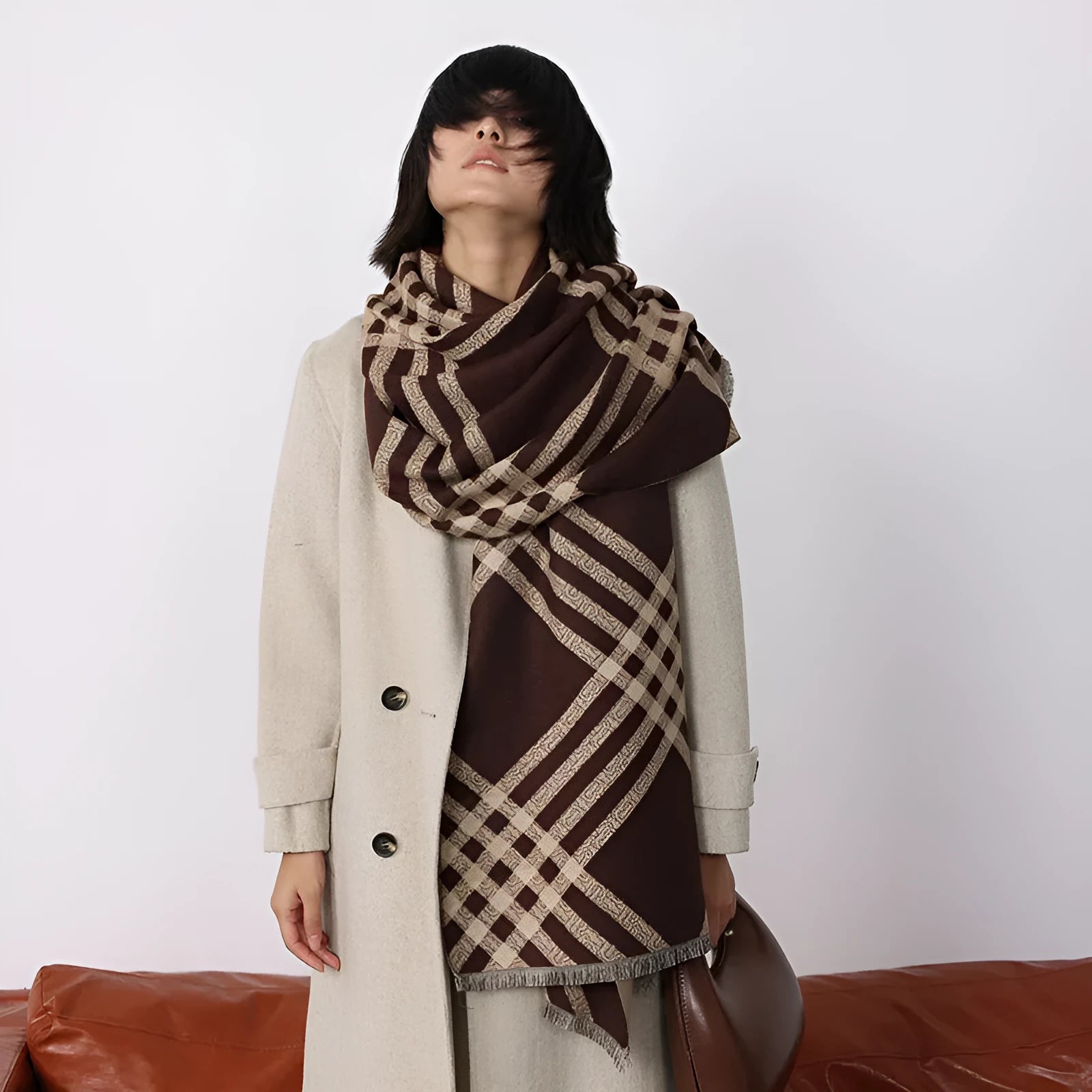 Long brown imitation cashmere scarf with tassel ends laid flat showing its full 185cm length.