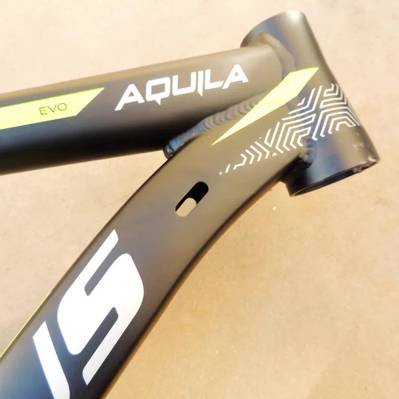Black green 29-inch aluminium mountain bike frame with internal cable routing and disc brake mounts.