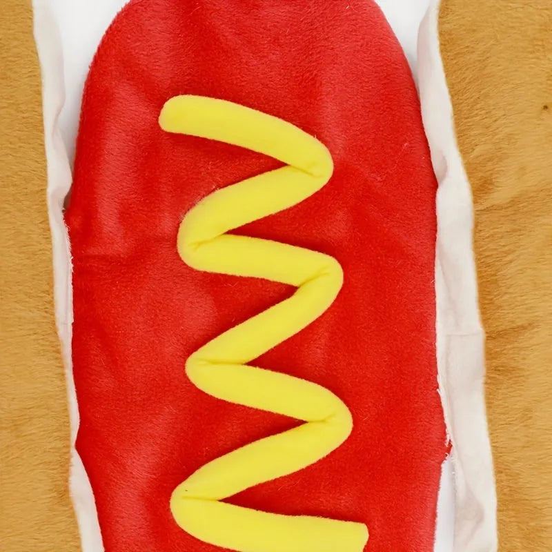 Small dog wearing funny hot dog costume with fleece lining for winter indoor events