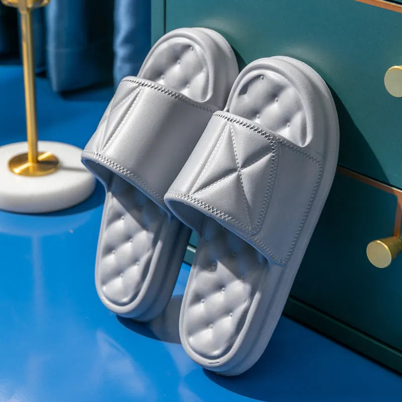 A pair of thick-soled EVA foam bath sandals in a chosen colour, showing the non-slip sole pattern.