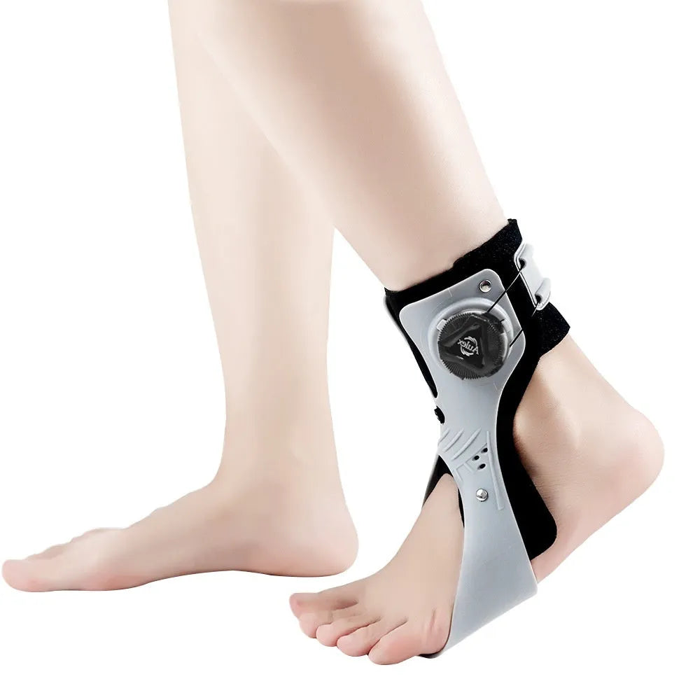 Grey ankle support brace with airbag button mechanism for left foot stabilisation