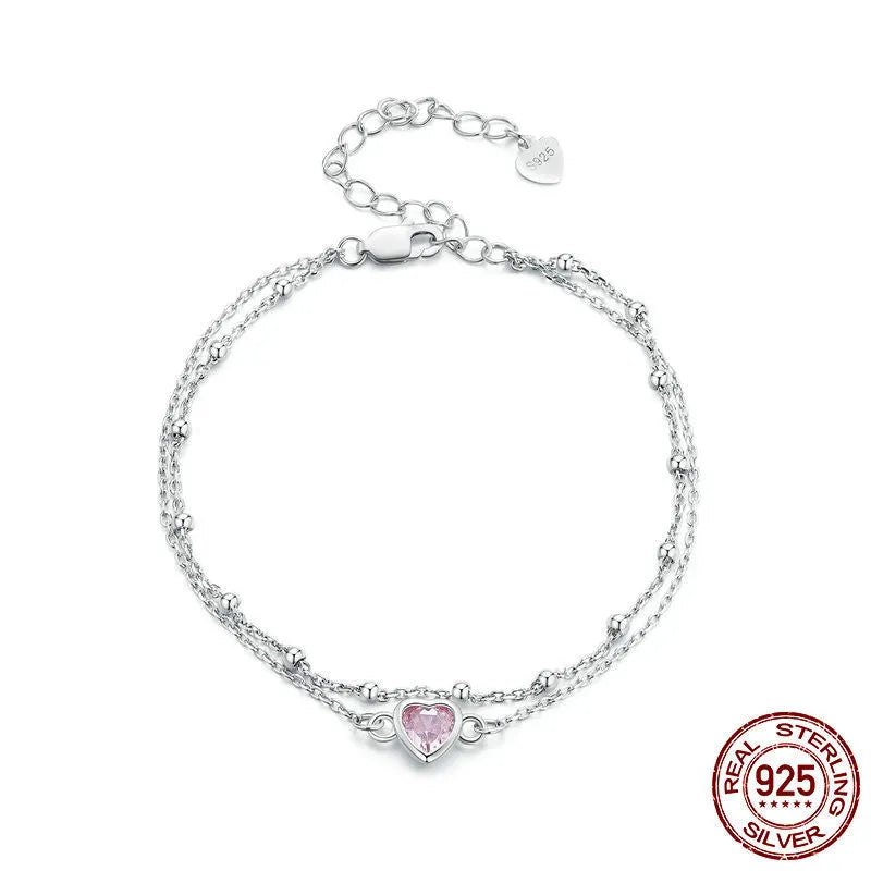 Sweet girlish style 925 sterling silver bracelet with heart pendant on adjustable chain.