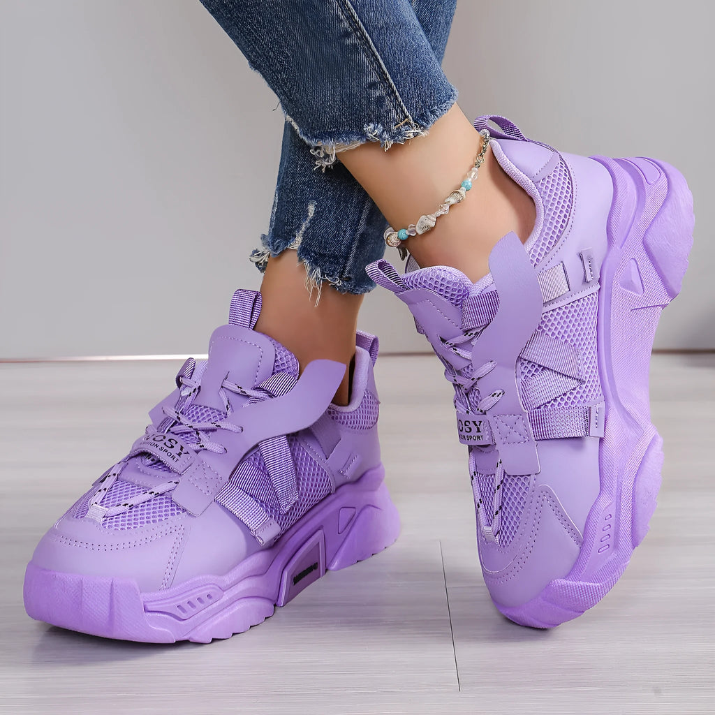 Women's platform mesh sports shoes in animal pattern design showing height increase sole and front lace-up closure