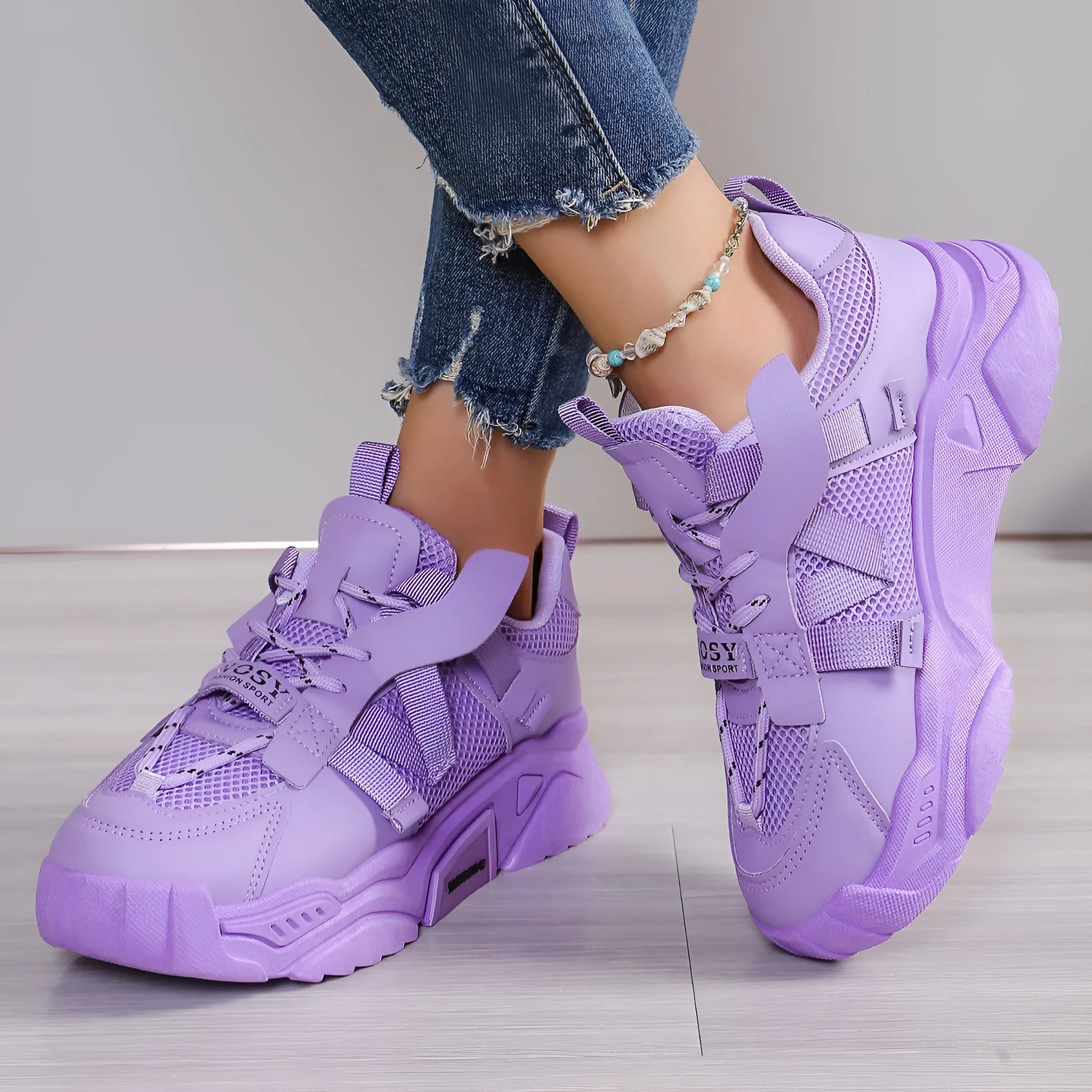 Women's platform mesh sports shoes in animal pattern design showing height increase sole and front lace-up closure