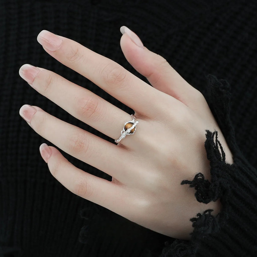 Women's adjustable silver open ring with Saturn design and white gold colour finish.