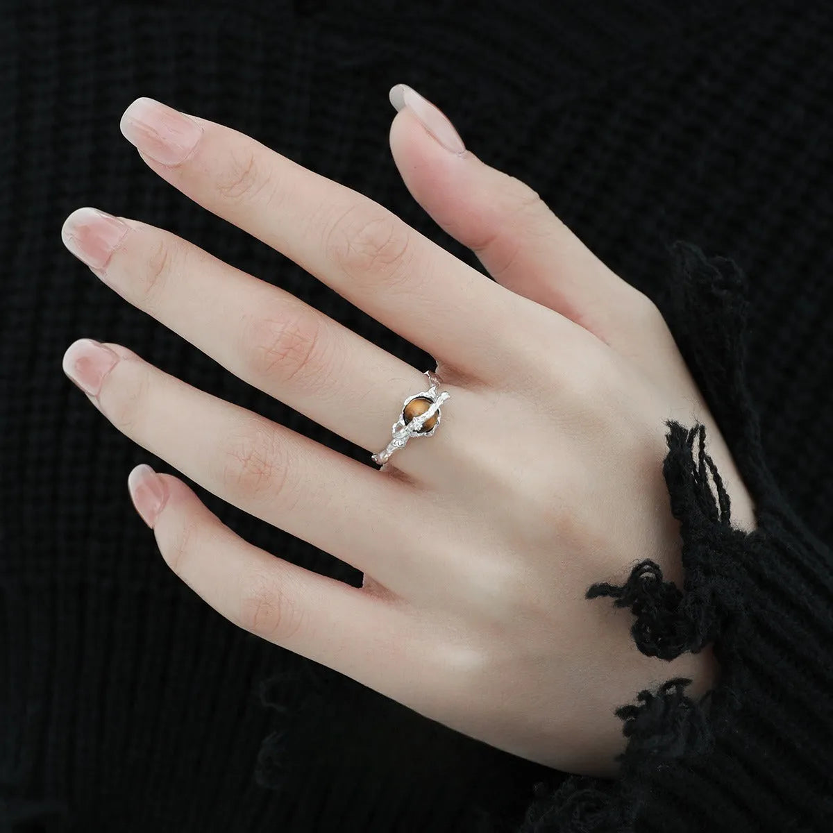 Women's adjustable silver open ring with Saturn design and white gold colour finish.