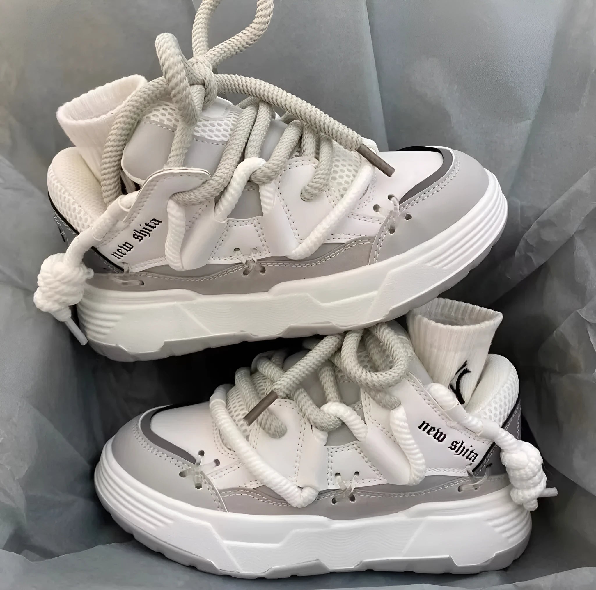 Women's grey retro chunky sneakers with thick rubber sole and lace-up front
