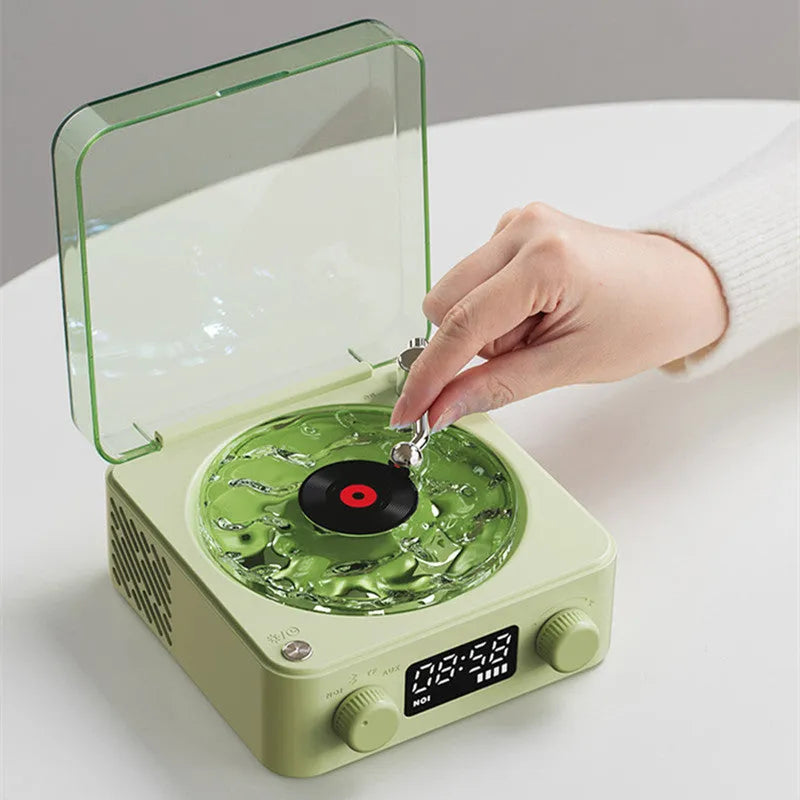 Retro turntable speaker with transparent water ripple turntable, Bluetooth 5.0, and white noise feature in a compact design