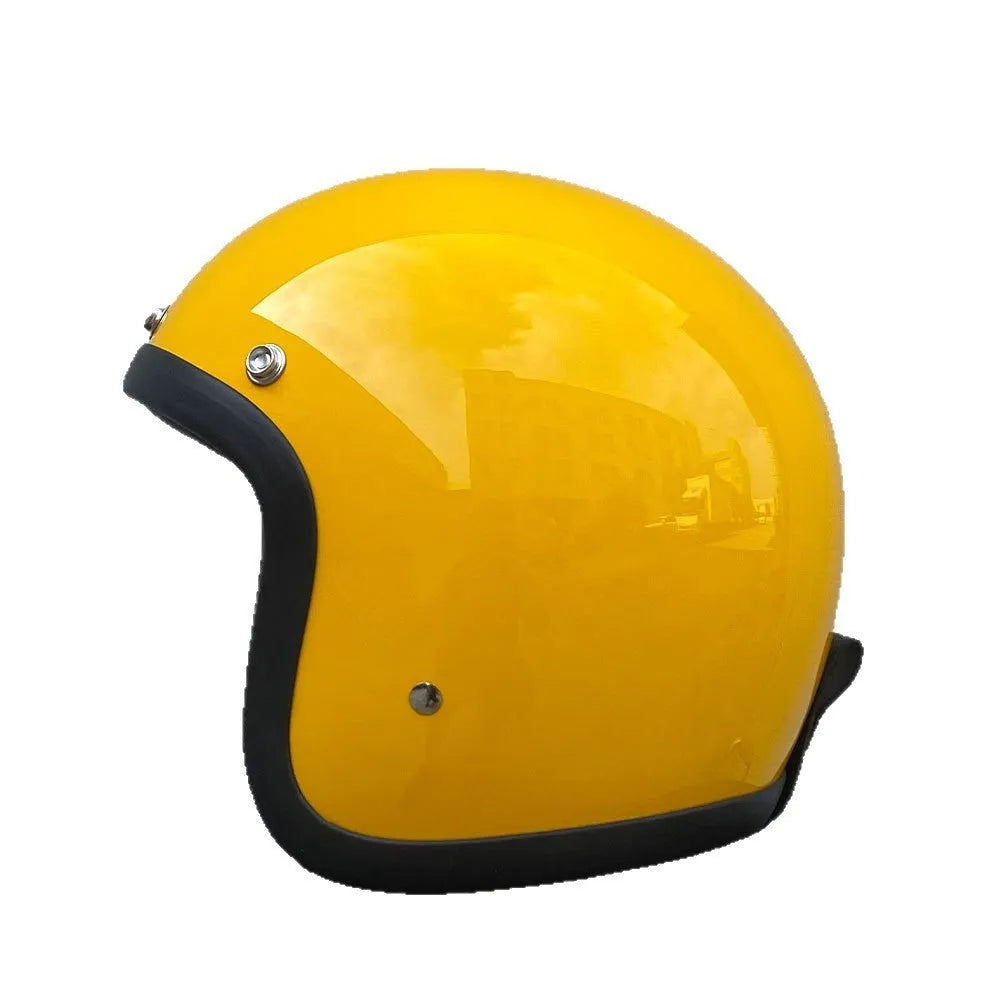 Glass fibre retro half motorcycle helmet shown in various colours including cement gray and matte black options