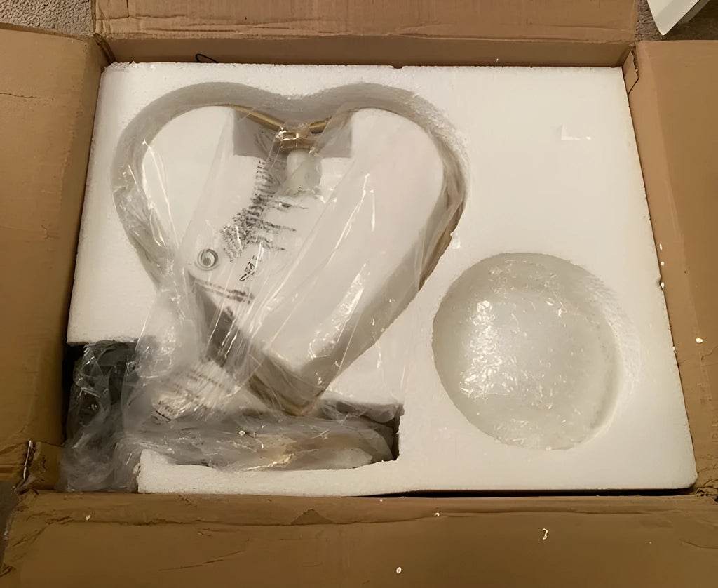 Clear acrylic heart-shaped USB night light with warm white LED on a surface.