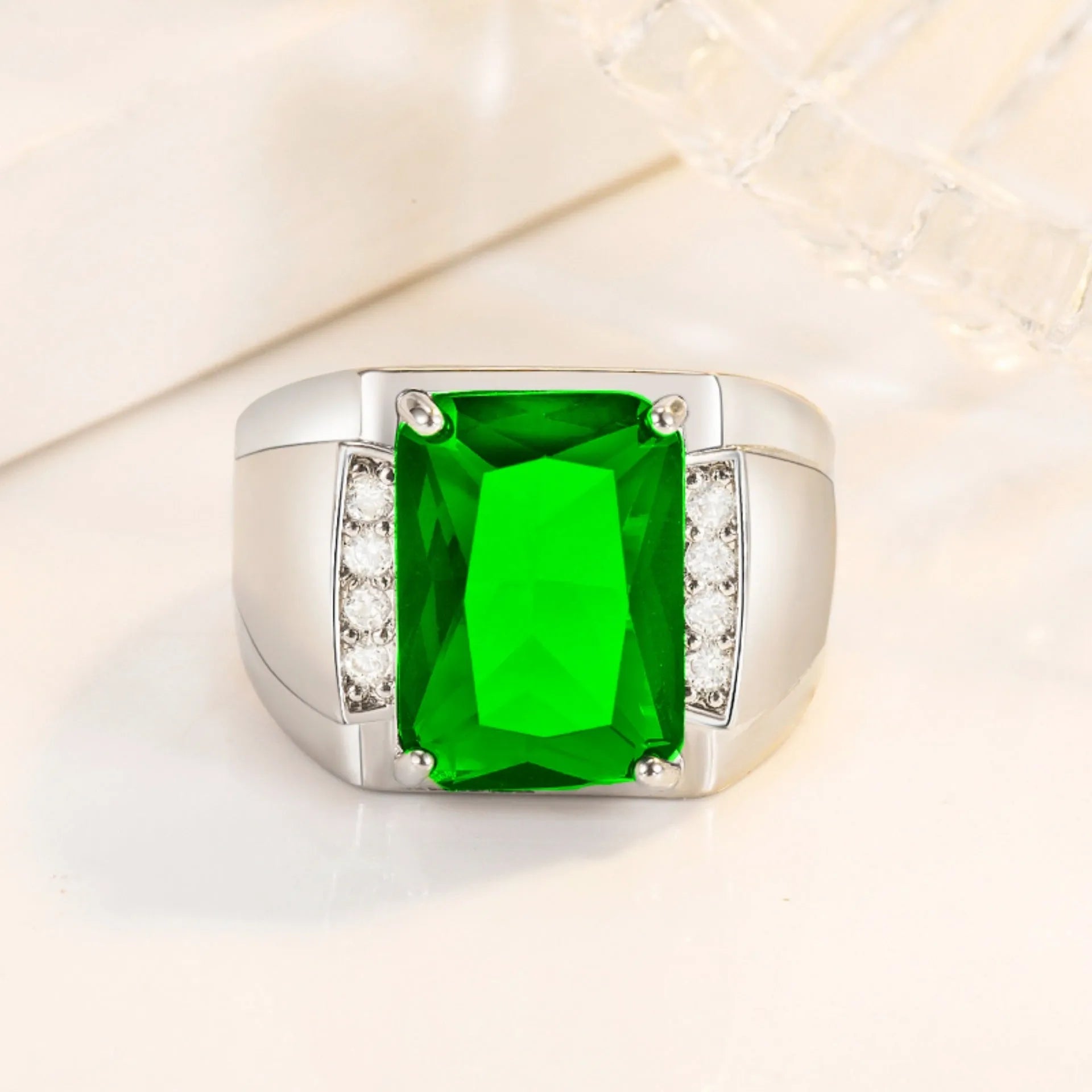 Adjustable open geometric ring with coloured rhinestone setting on copper band.