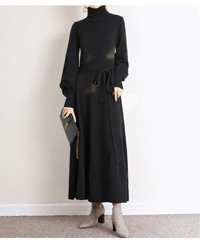 Rose red loose fit turtleneck knitted dress with long sleeves and a midi-length skirt.