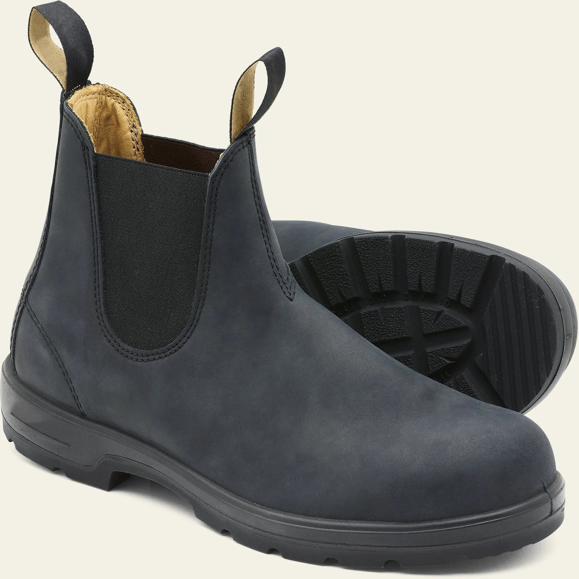 Vintage brown Chelsea boots with frosted PU upper and beef tendon sole on a neutral background