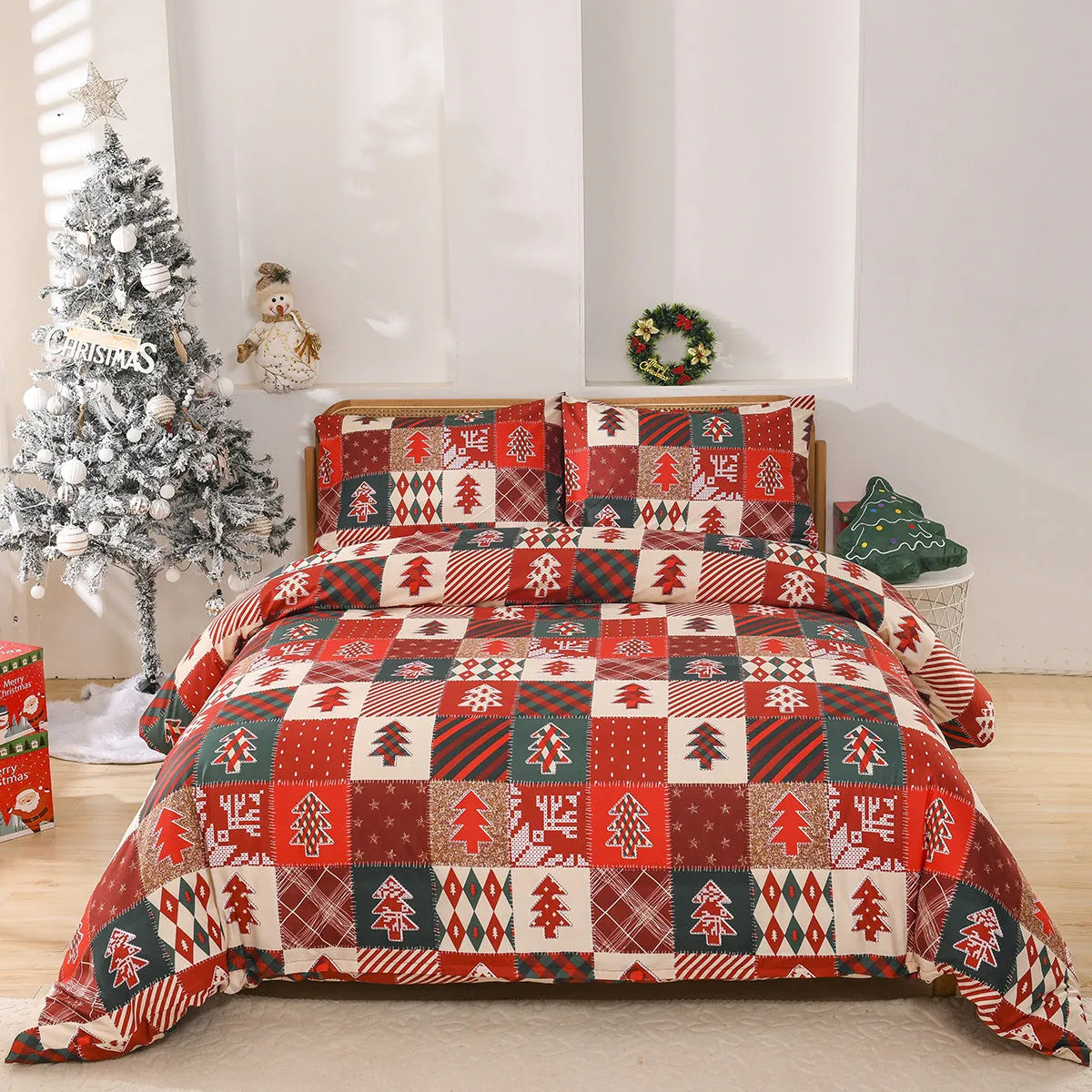 Red and black plaid Christmas pattern quilt cover and pillowcases on a bed.