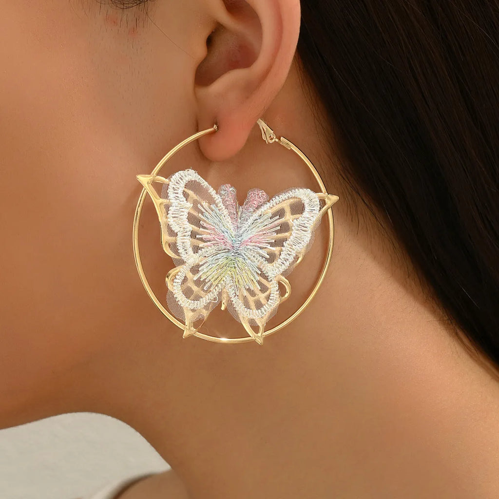 Gold butterfly clip-on earrings for women with geometric design and iron construction