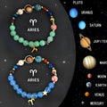 Set of two natural stone beaded bracelets for zodiac signs on a neutral background.