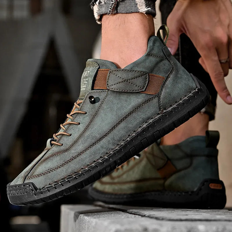 Men's mid-calf Martin boots in khaki colour with elastic band closure and tooling stitching