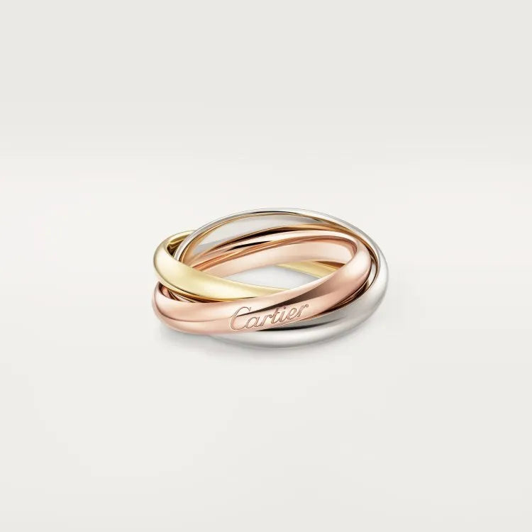 A geometric U-shaped silver couple ring engraved with text, shown in a gold rose silver finish.