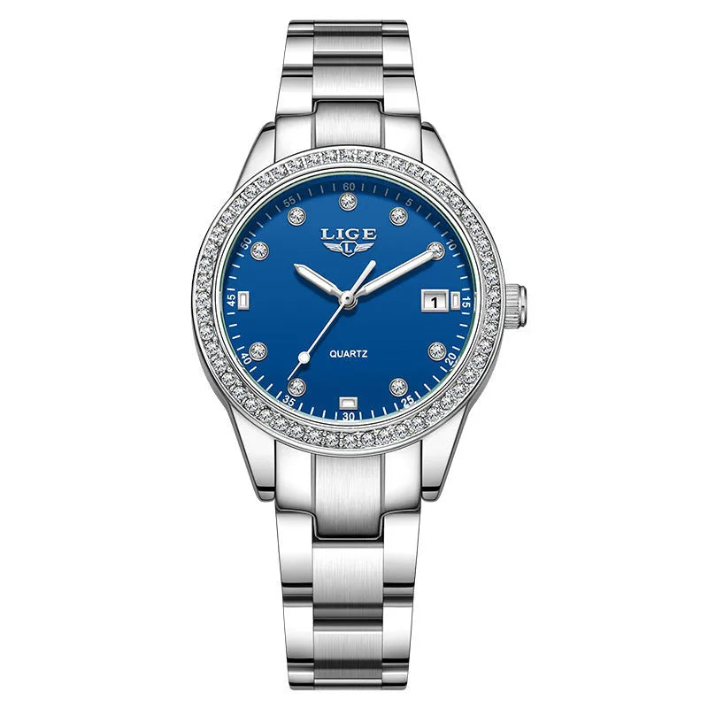 Silver stainless steel women's quartz watch with luminous hands on a 34mm round dial.