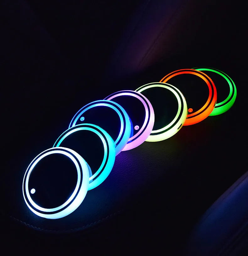 LED light-up car cup holder coaster showing seven colour options with solar panel and USB charging