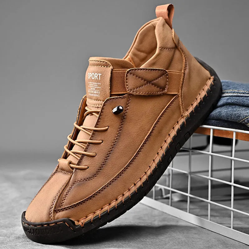 Men's mid-calf Martin boots in khaki colour with elastic band closure and tooling stitching