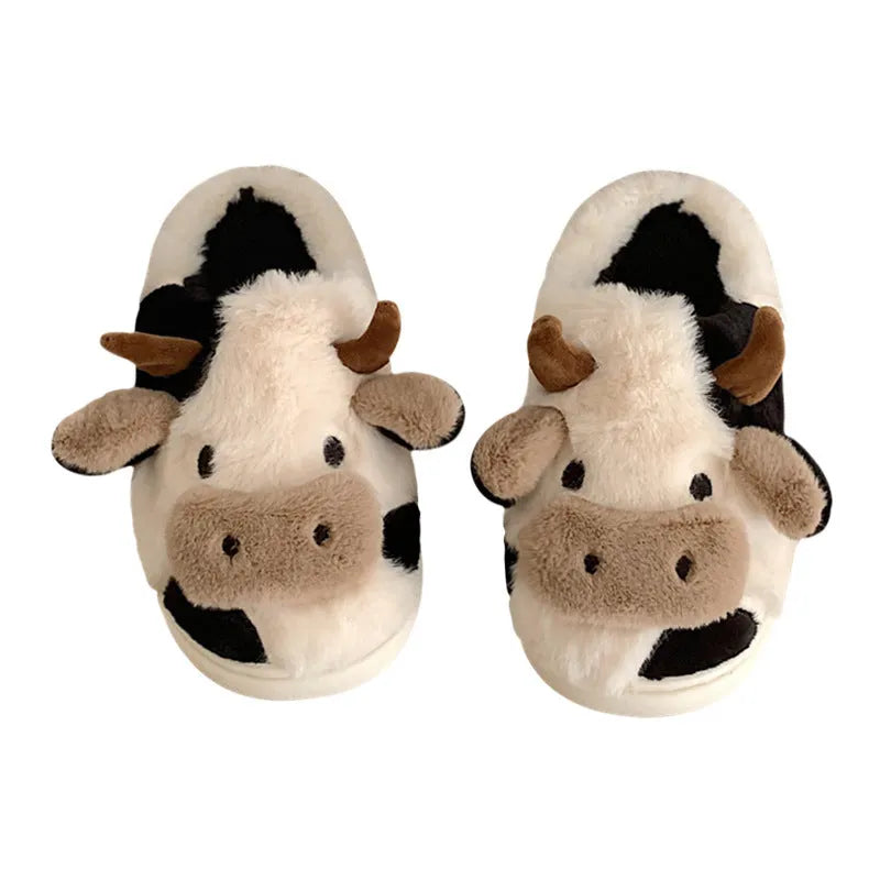 White cow pattern slippers with faux fur upper and textured non-slip soles