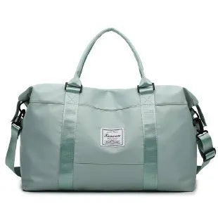 Travel duffel bag in black with soft handle and zipper opening, 20-35L capacity for weekend trips and gym