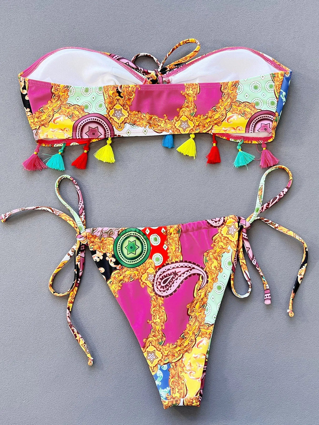 Women's printing pattern tube top bikini set with briefs on a mannequin.