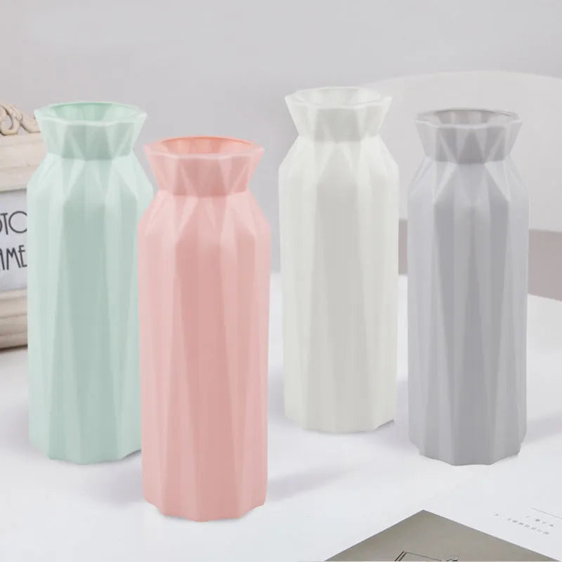 Green melamine drop-resistant vase with a wide base on a wooden table