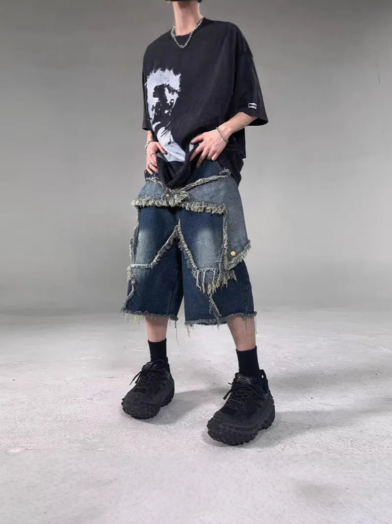 Men's blue denim shorts with frayed five-pointed star detailing and loose fit for summer casual wear